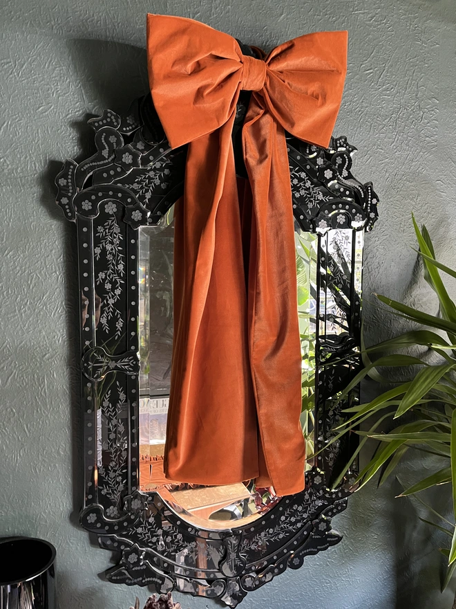rust velvet bow decoration