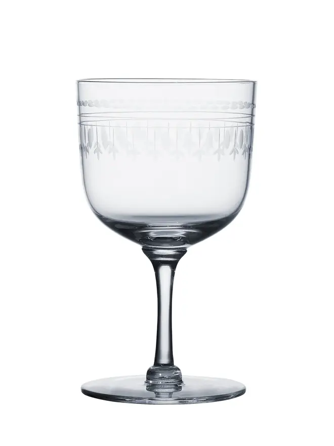 'daphne' engraved ovals wine glass. a wine glass patterned with oval detailing.