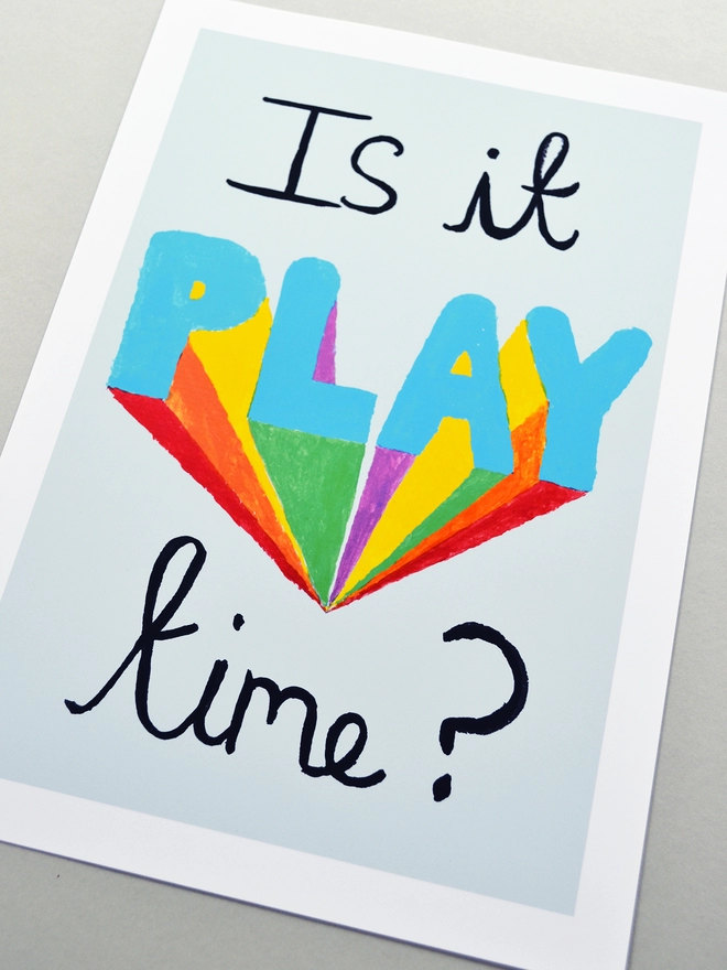 Close up of an art print saying 'Is it play time?'
