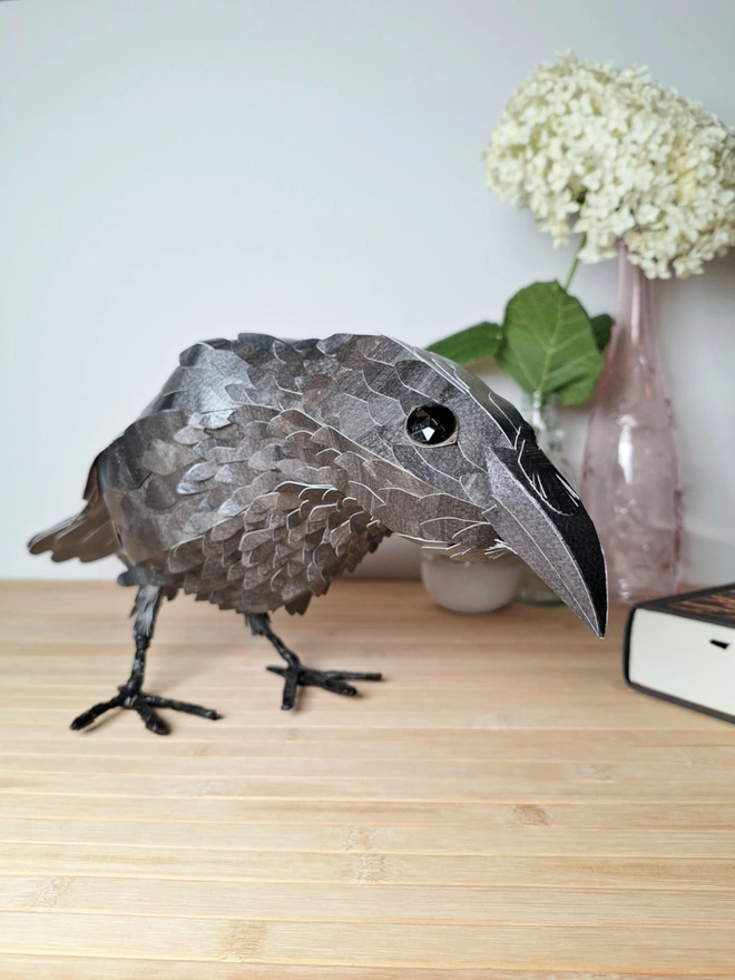 front view of a raven sculpture