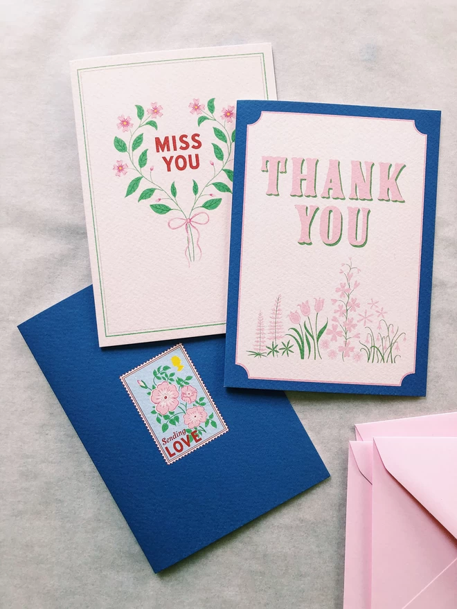 Greeting cards designed by Flora Fricker, vintage inspired aesthetic, hand drawn lettering, pink blue and green florals