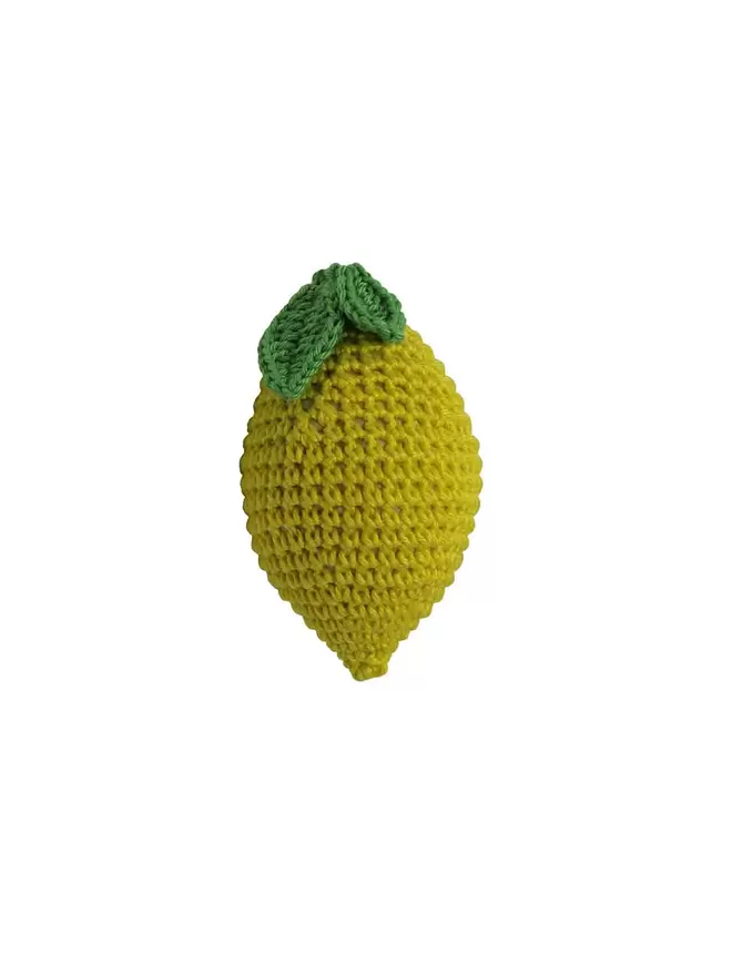 Image of cut out crochet lemon to show detail. 