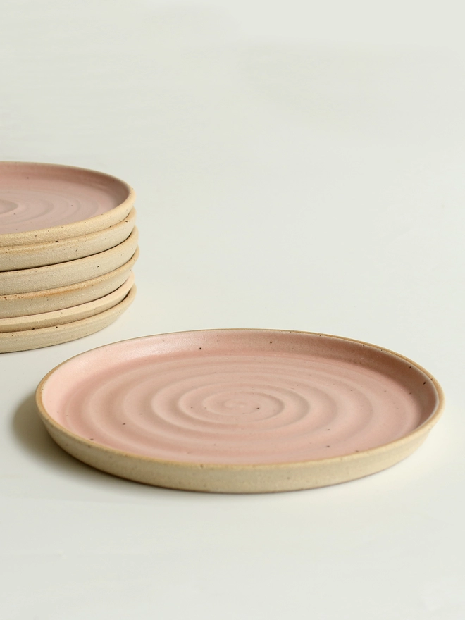 Pale pink side plate with plate stack