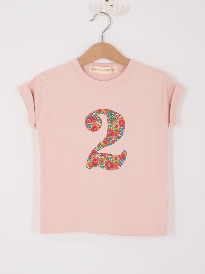 a pink number birthday t-shirt featuring a floral liberty number 2 on the front.