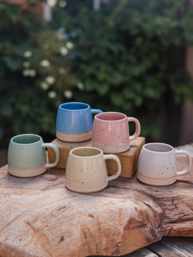 Small pastel stoneware mugs