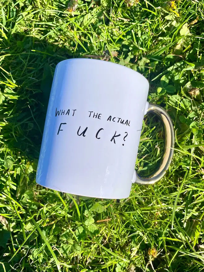 Mug reads 'what the actual fuck?'