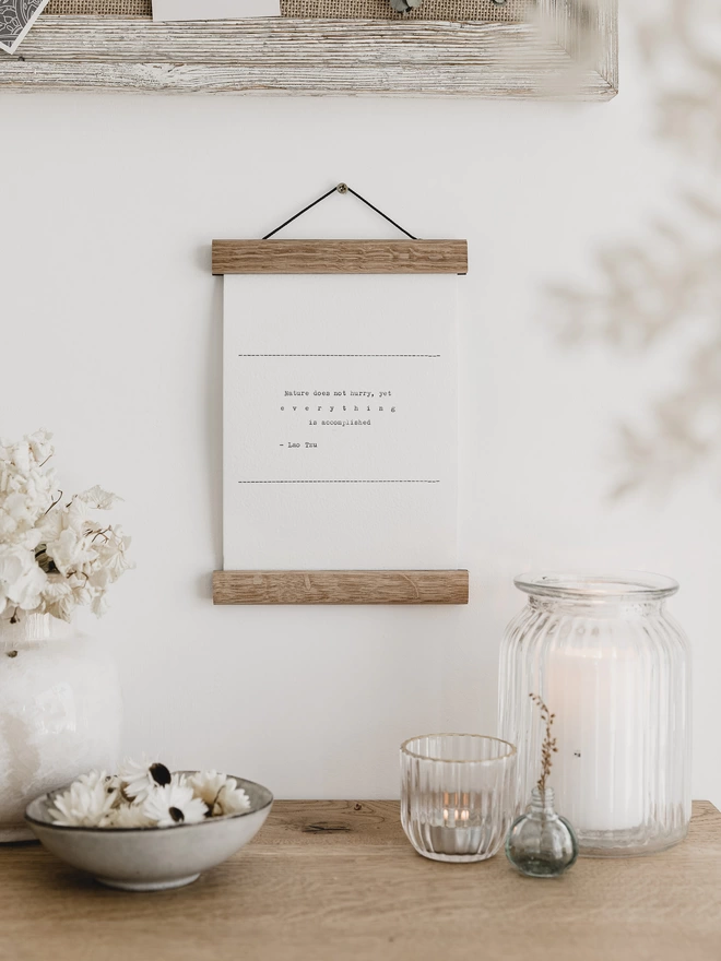 Inspirational quotes - typed wall hanging in a wooden print hanger