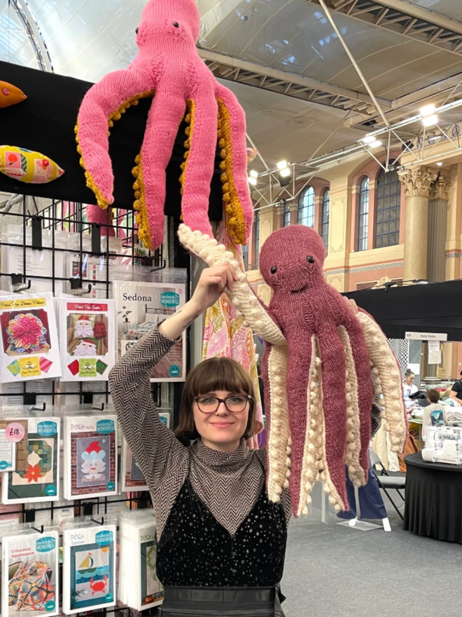Octopus Knitting Kit. Two knitted octopi.