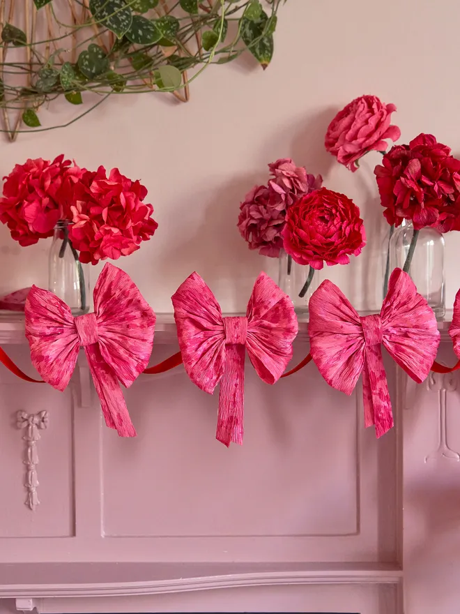 Pink bow crepe paper bunting