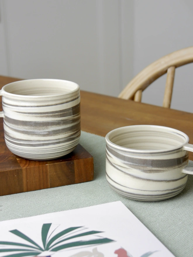 Small and large handmade grey and white marble mugs