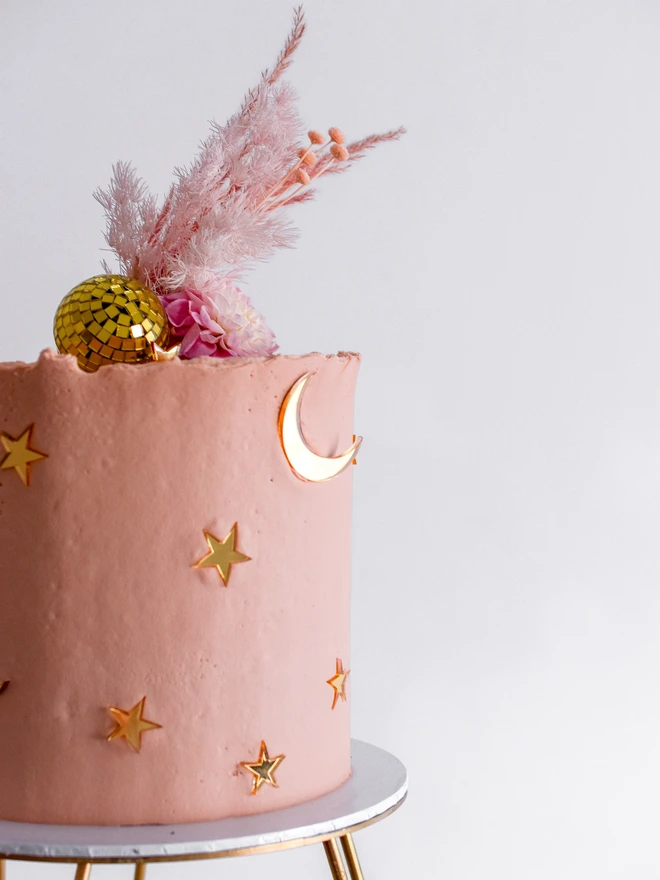 birthday cake with moon and star charms