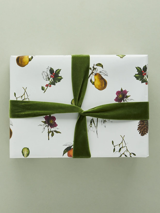 white base spaced out christmas pattern wrap with festive botanical elements 