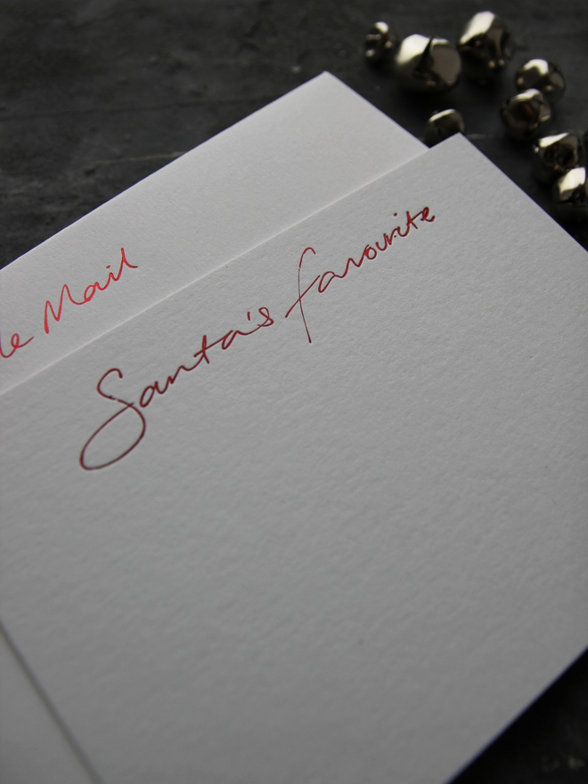 christmas notecard hand foiled in red, says Santa's Favourite, envelope with North Pole Mail hand foiled on it