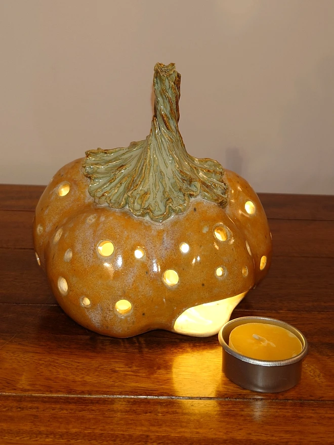 Pumpkin candle holder