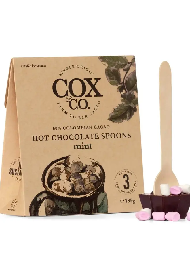 Cox&Co Mint Hot Chocolate Spoons (Set Of 3), a hot chocolate spoon sitting next to its packaging on a white surface. 