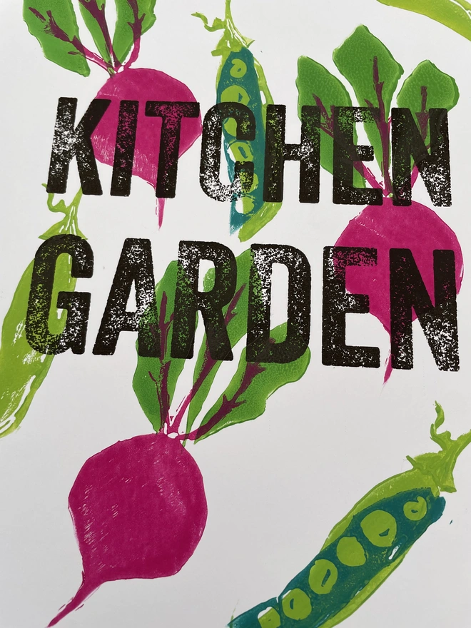 Hand-printed lino kitchen print featuring pea and beetroot illustrations. 