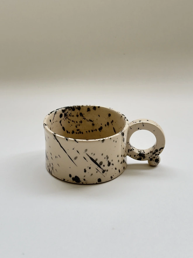 Black speckled modern ceramic mug