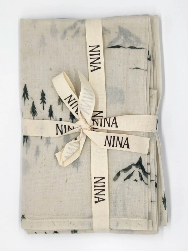 The Way Home Muslin. A muslin with a wildlife monochromatic pattern.