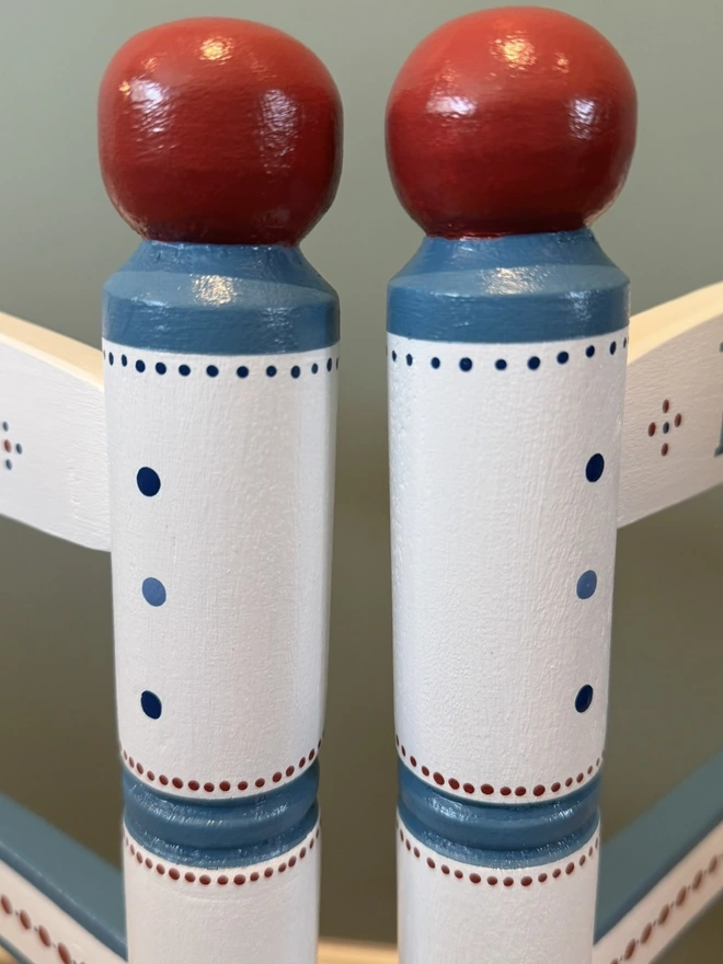 Childs christening chair. Red and blue details. 