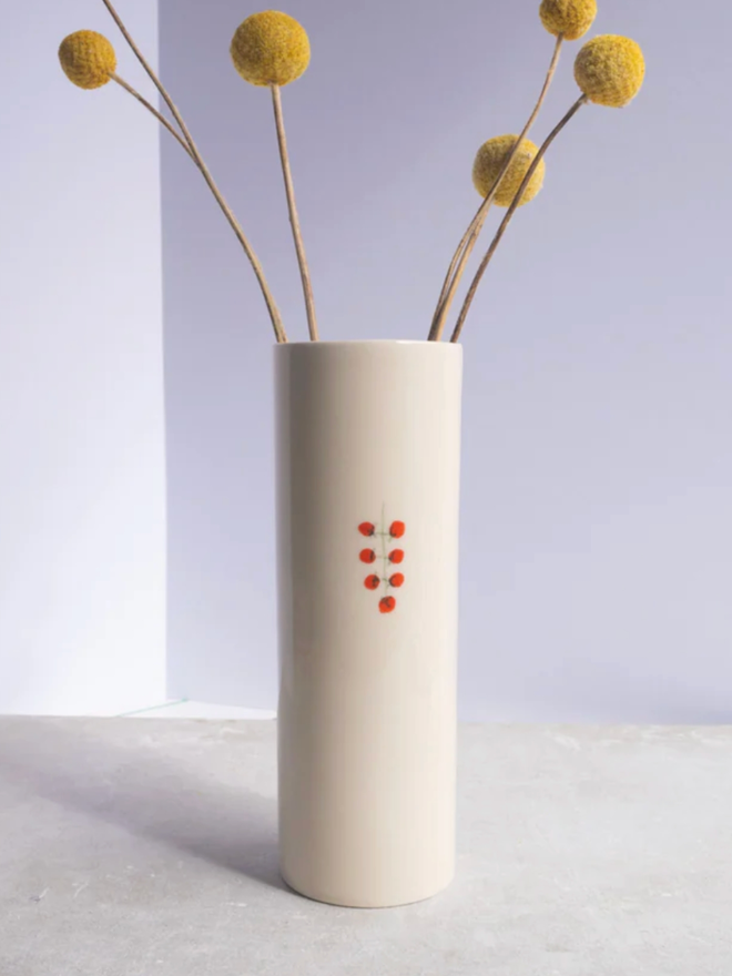 Symbol Vase. A vase with a tomato design.