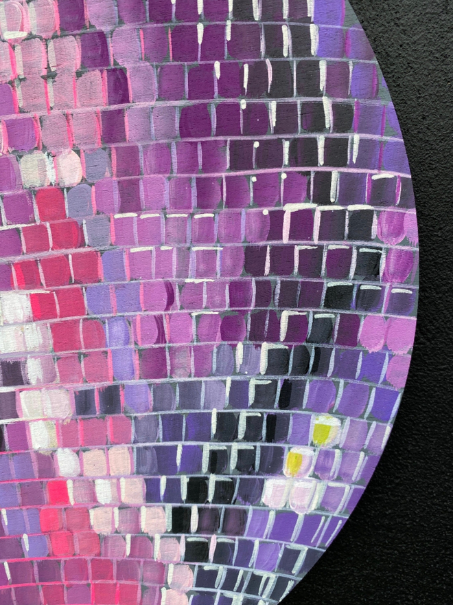 Close up of the pink and purple Hello Sunshine disco ball.