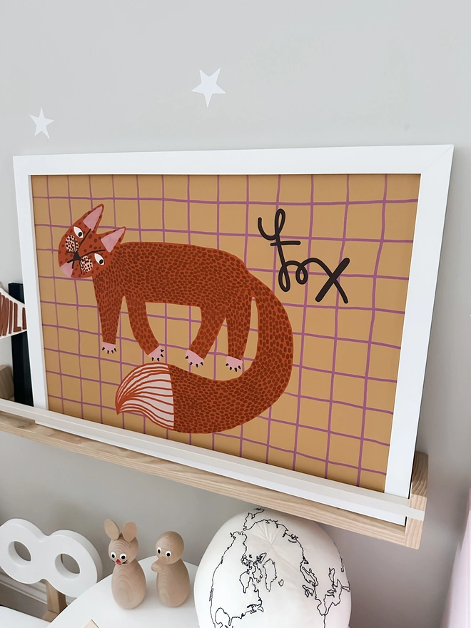 Fox Wall Art Print - an orange fox on a warm grid style background. The perfect print for a woodland themed room, playroom or baby nursery. 