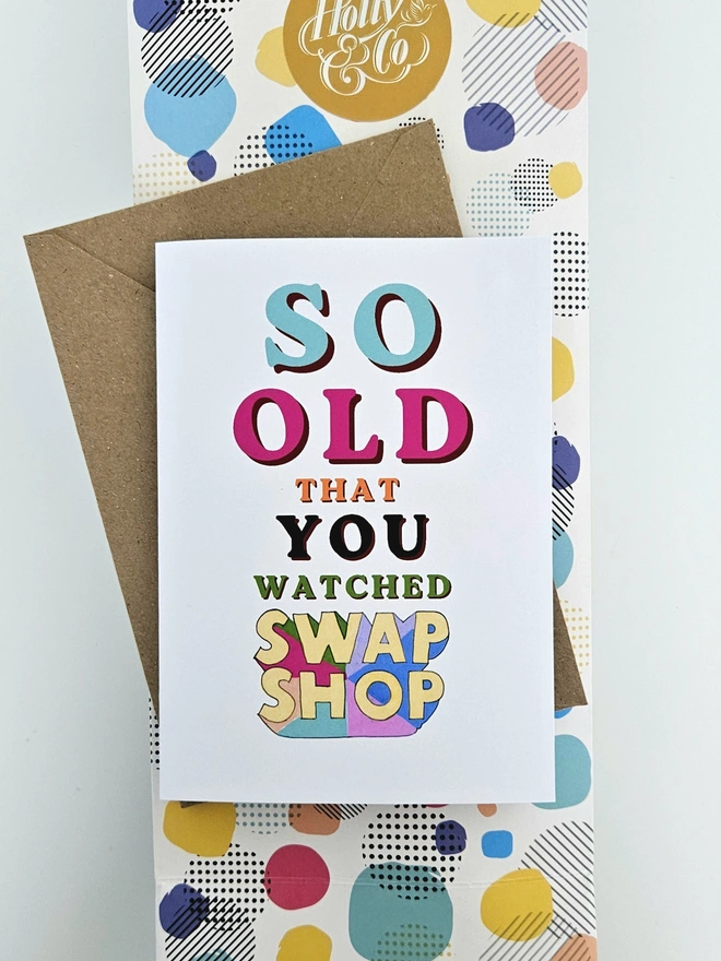 A nostalgic card that says So old that you watched Swap Shop in colourful retro style fonts on a white background.