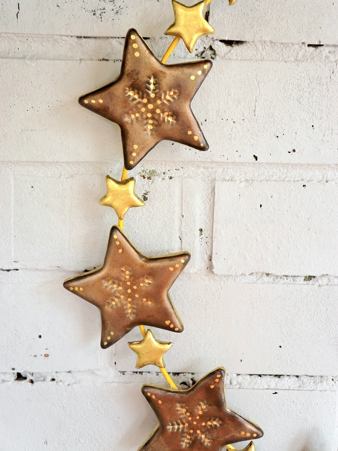 large ceramic christmas wreath, christmas star wreath, ceramic star wreath, gold star wreath, Christmas wreath, Jenny Hopps Pottery, Christmas decoration, christmas wall hanging