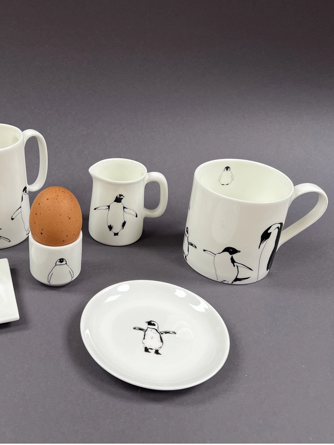 The multi penguin complementary products including round and rectangle trinket trays, quarter and half pint jugs, egg cup and mug that are great for house warming,wedding and anniversary gifts