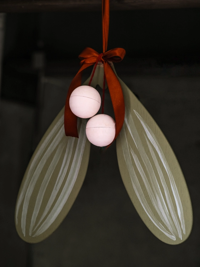 giant handpainted wooden mistletoe