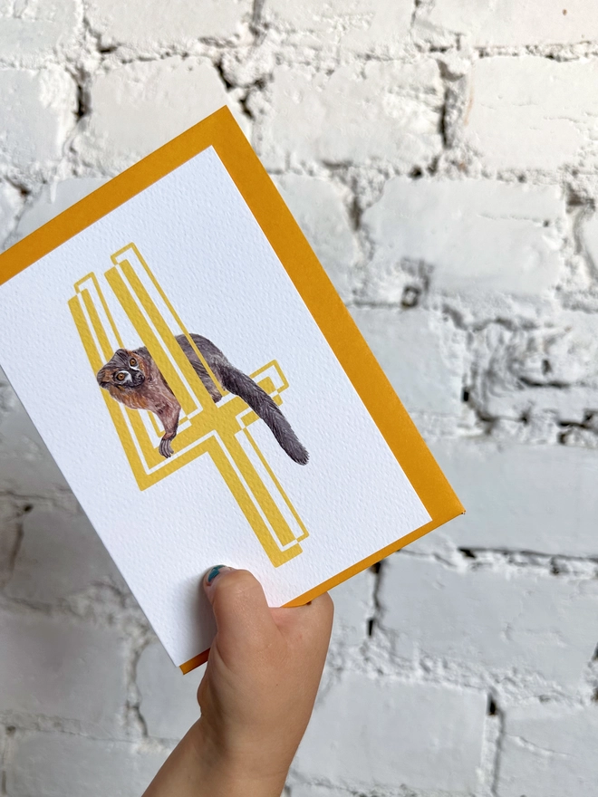 a white card with a big yellow 4 and a lemur illustration with a bright yellow envelope