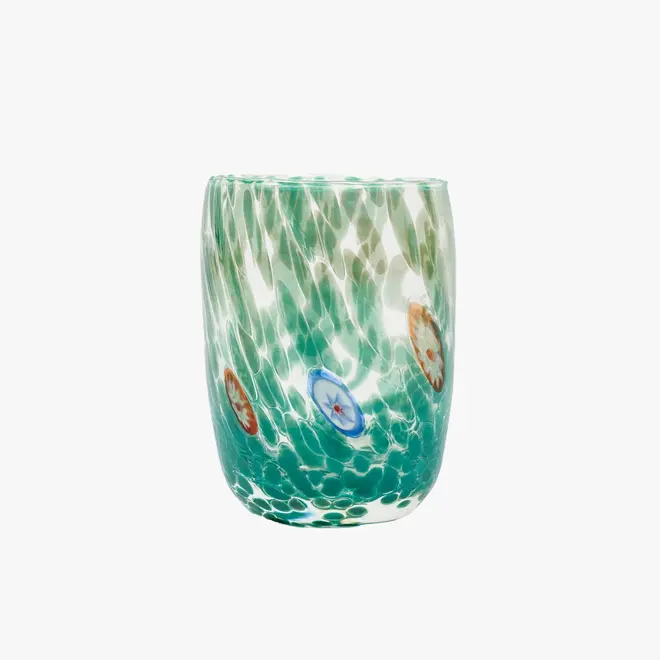 round tumbler glass with teal splotches