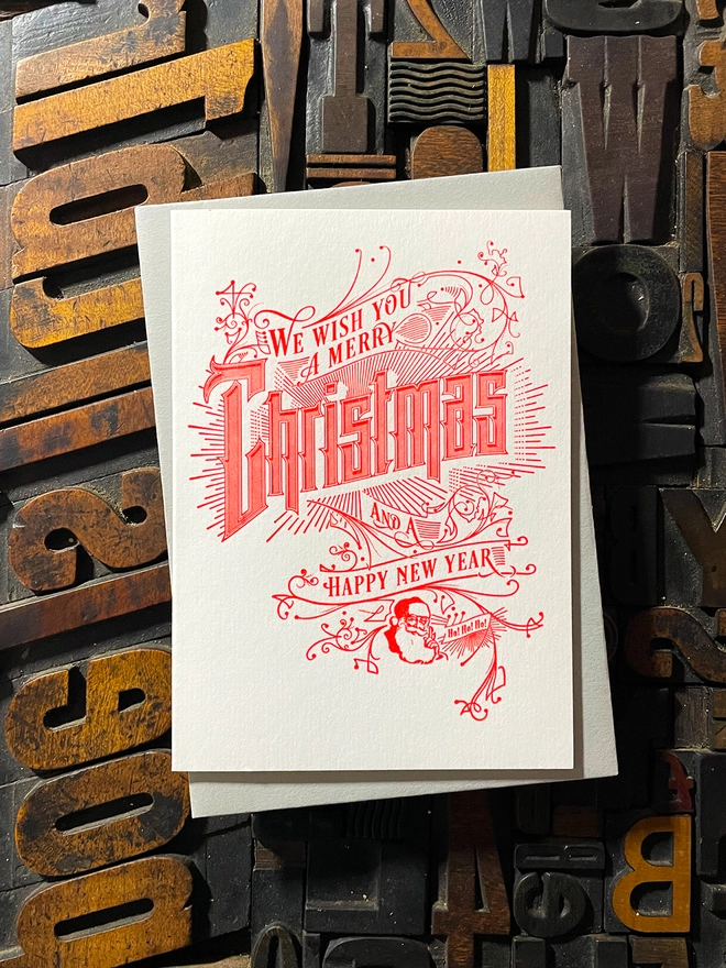 Spread festive cheer with this charming vintage Santa letterpress Christmas card! These cards are printed with my own fair hands on my 1915 Arab Crown Folio Press. Printed in red ink.