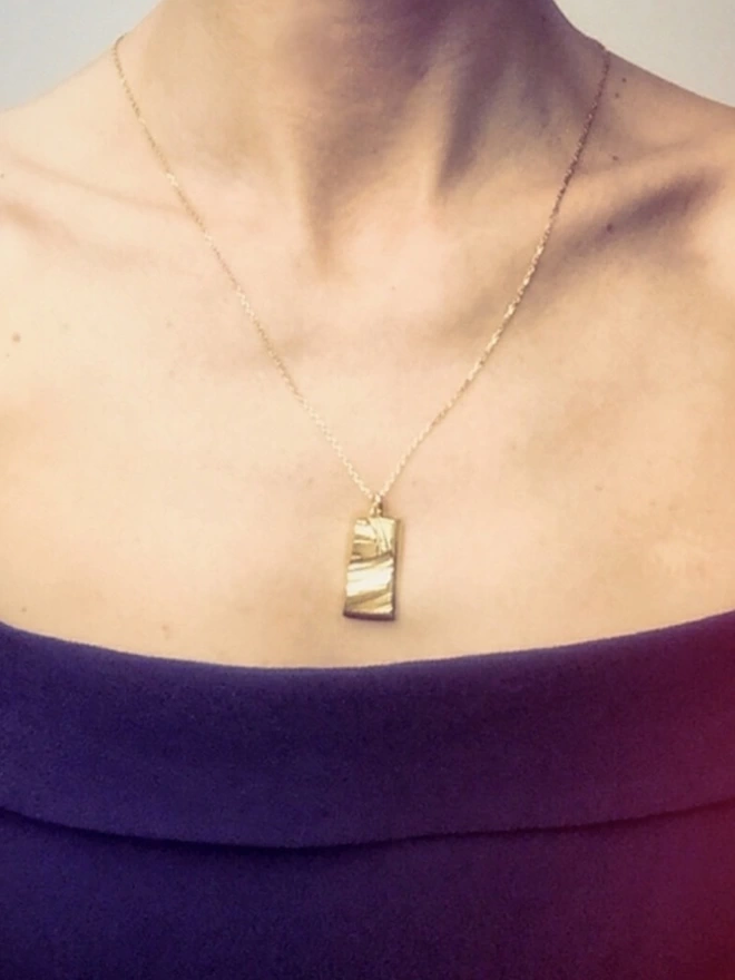 chunky rock like rectangular pendant
