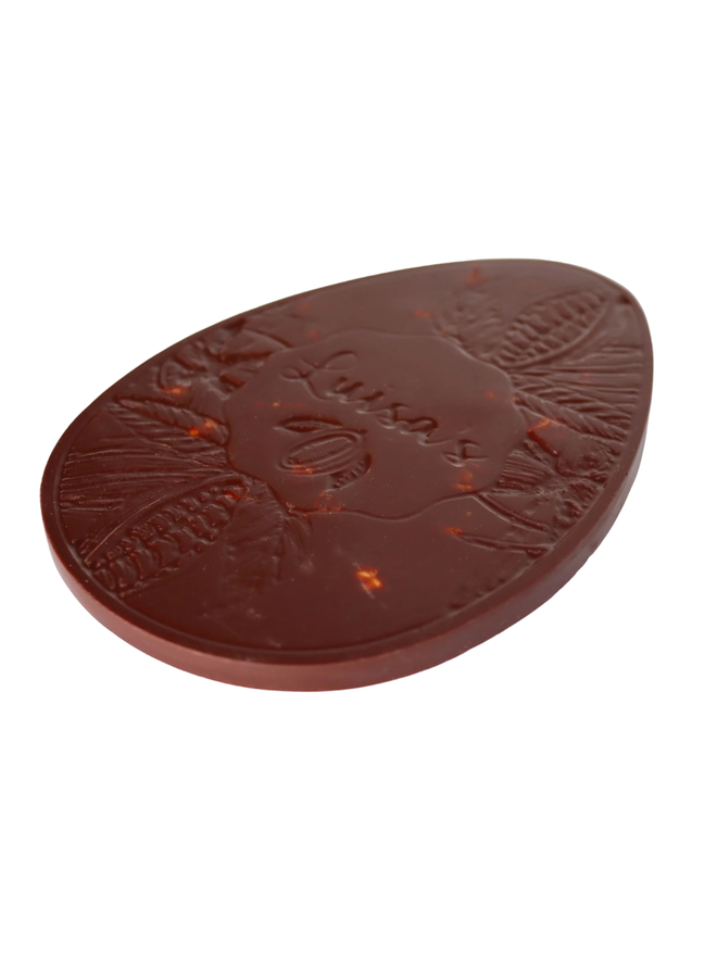 75% Vegan Chocolate With Hazelnuts Easter Egg on a white background