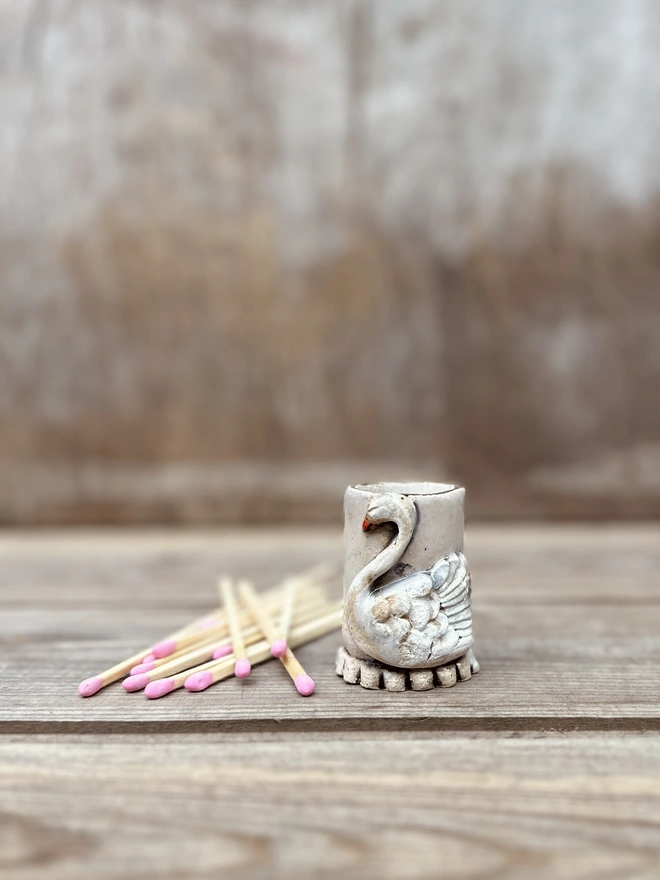 Graceful swan match pot