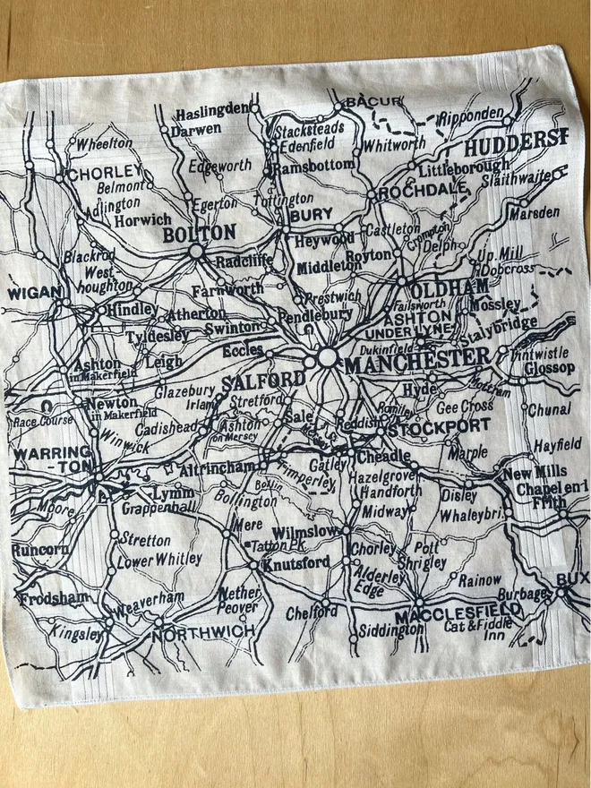 Mr.PS Greater Manchester Handkerchief laid on a wooden table showing the vintage road map