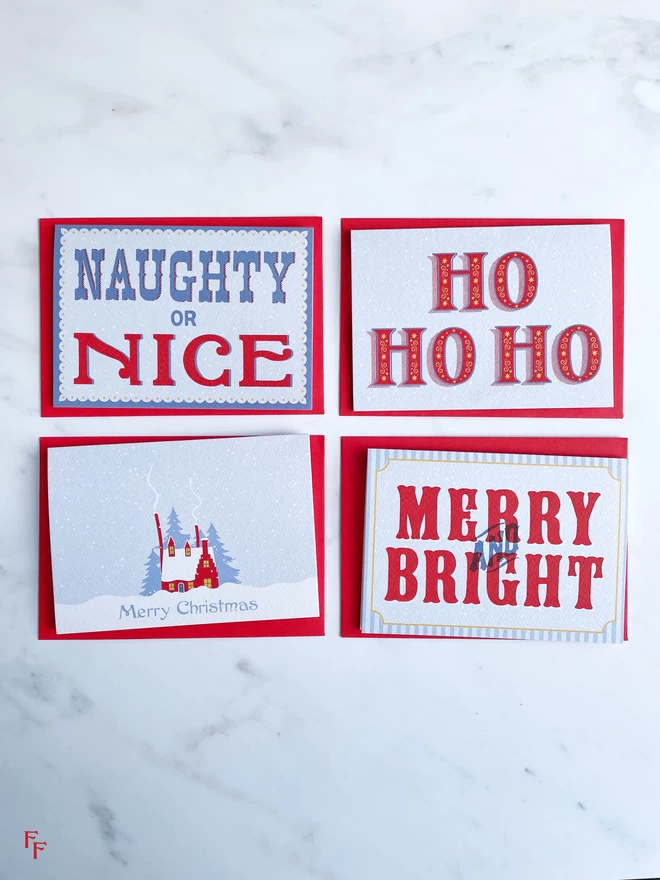 vintage typography and hand lettered christmas cards in blue and red