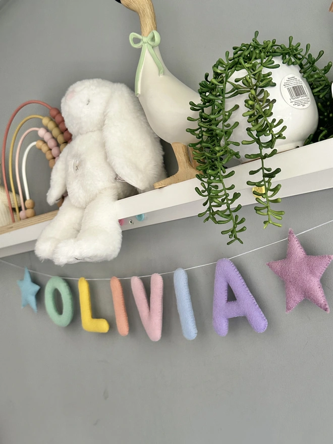 Personalised Name Garland with Stars, a colourful garland in a child’s bedroom,  baby gift, nursery decoration, kids bunting 