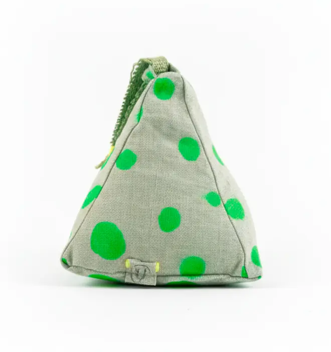 Hand Painted Linen Sustainable Doorstop In Polka Dot Print, a neon green doorstop against a white background. 