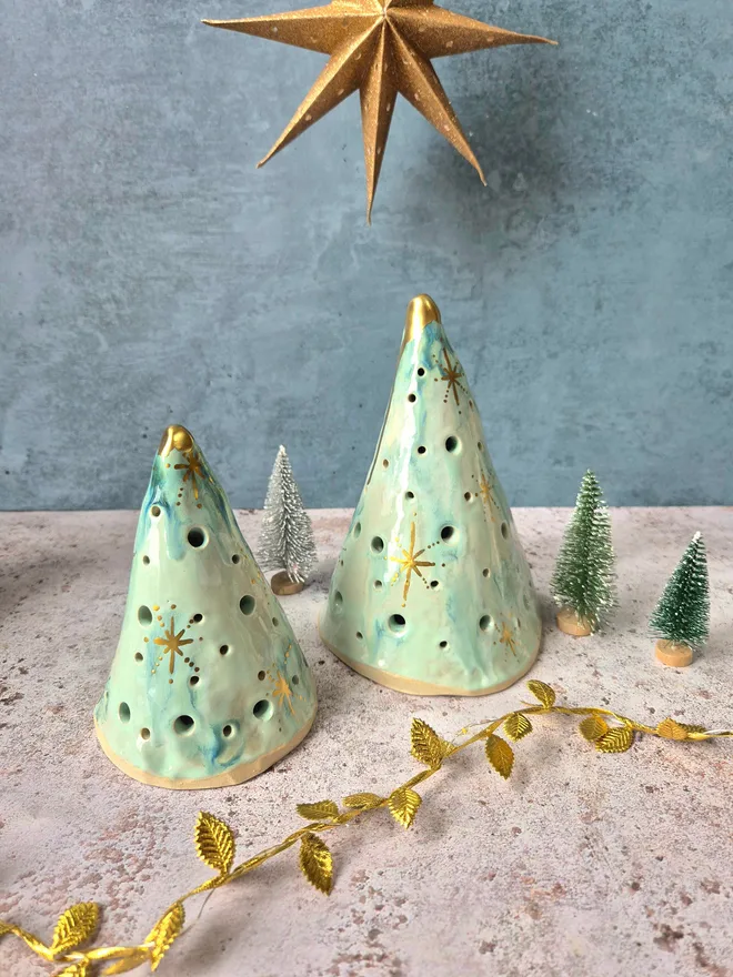 Ceramic christmas tree tea light holder, clay, pottery, Christmas decor, mantlepiece decor, christmas decoration, white with gold details, photographed with a gold star and gold leaves