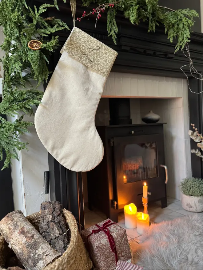 Floral Linen Christmas Stocking. Natural Linen Stocking with green floral cuff