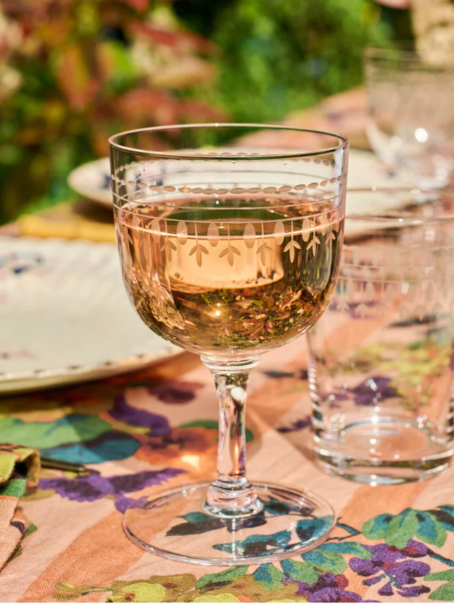 'daphne' engraved ovals wine glass. a wine glass patterned with oval detailing.