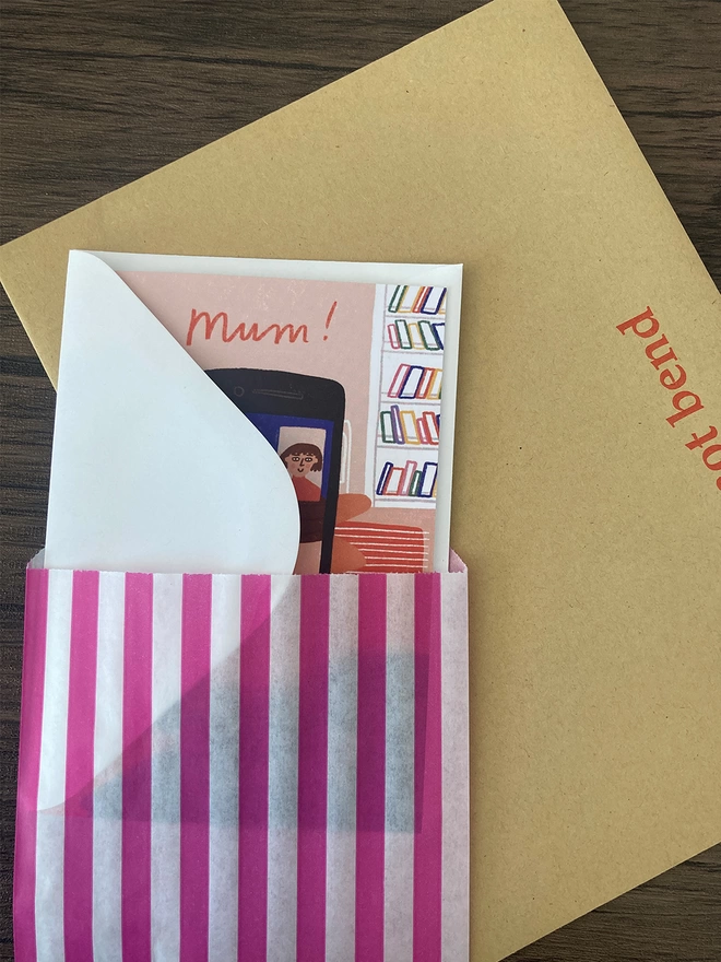 Mum card packed with a white envelope inside a paper bag