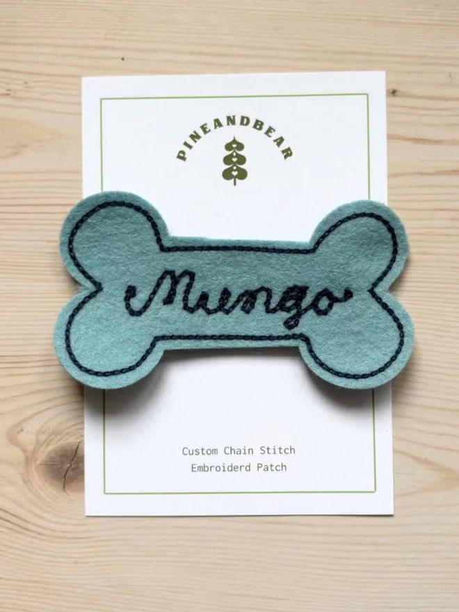 Personalised embroidered dog name patches in teal