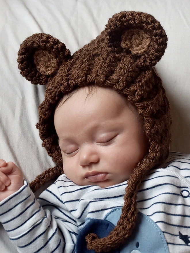 Newborn wearing Bear Bonnet