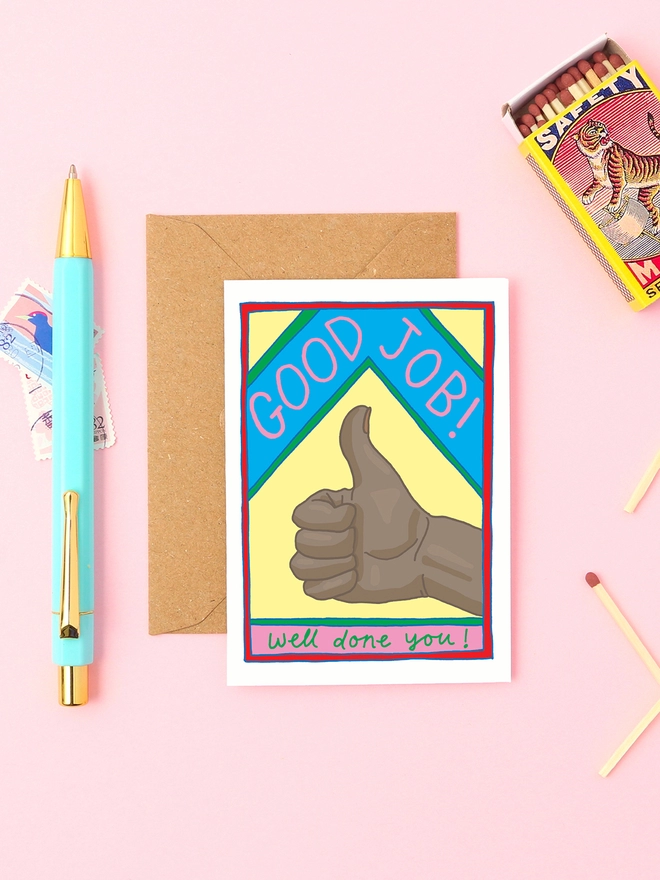 Good Job! A well done card featuring a black hand with thumbs up