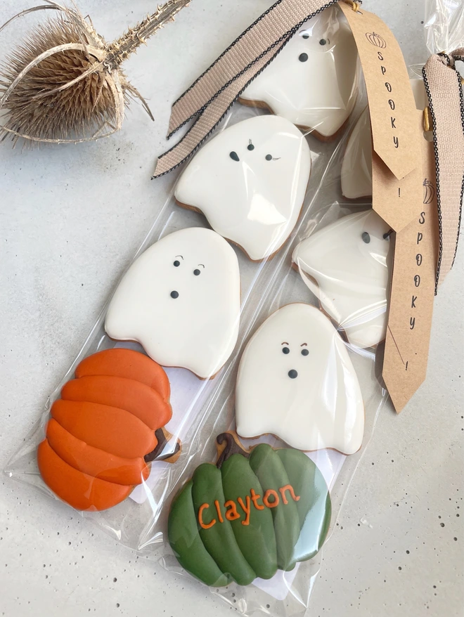 ✅ Alt Text for Images: “Hand-iced Halloween Ghost and Pumpkin biscuits, individually wrapped, in Vanilla or Gingerbread flavour