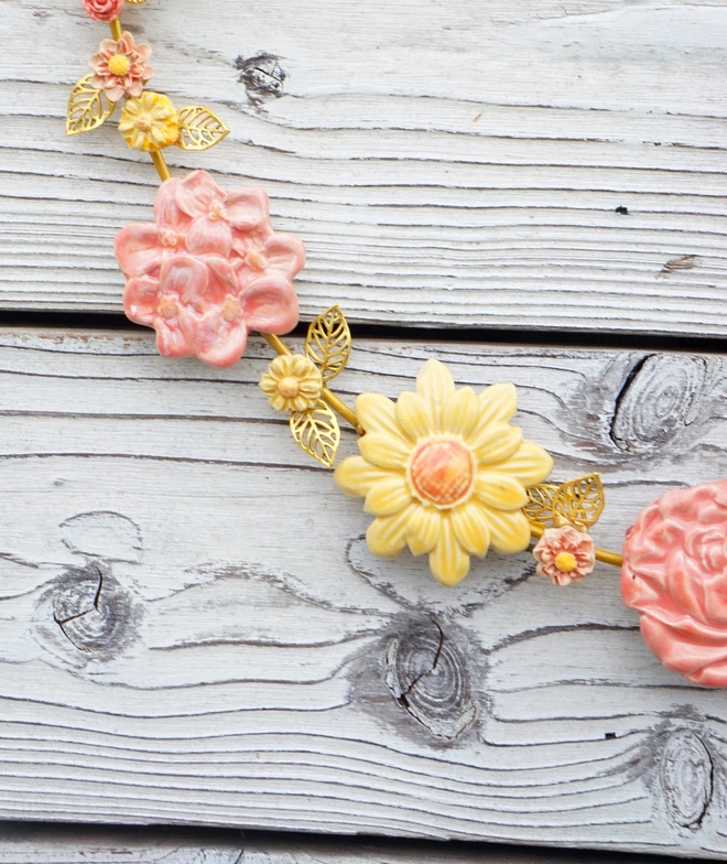 flower wreath, ceramic flower wreath, Flower decoration, flower wall hanging, Jenny Hopps Pottery, decorative wreath