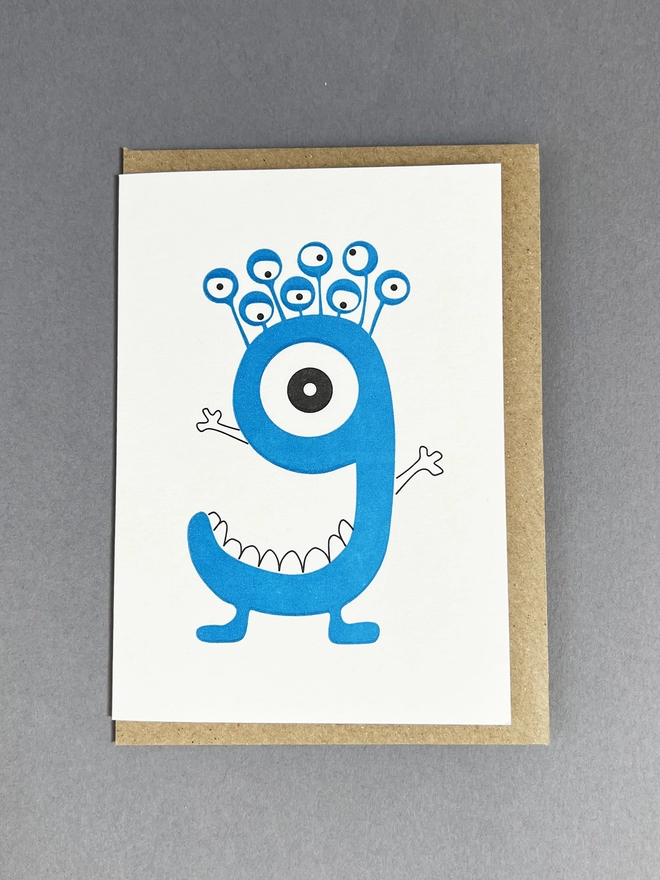 Letterpress printed neon blue number nine card with envelope for chidren's birthday